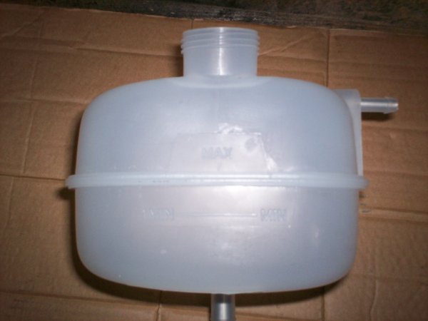 Photo of the Elise plastic header tank lotus spare part